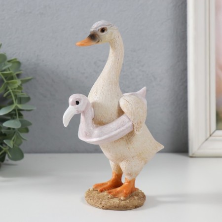 Polystone souvenir "Goose in the inflatable circle - flamingo" 10.5x7.5x16.5 cm