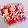 Soft doll "Girl", a flower dress, color mix