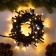 Garland “thread” 10 m, IP65, UMS, dark rubber thread, 100 LED, warm white glow, flicker, 220 V