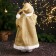 Santa Claus "in a cap, a gift and berries" 46 cm, gold