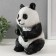 The piggy bank "Panda Burning" height is 23 cm, width 16 cm, length 14.5 cm.