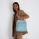 Women's backpack made of artificial leather with lightning, 3 pockets, blue color