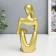 Souvenir Polystone "Abstraction - expectation" gold 19x6x8 cm