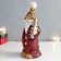 Suvenir Polystone "Santa Claus in a red coat with a gold Christmas tree" 9.5x9.5x22.5 cm
