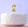Candle for the cake, the number "2", gold.