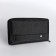 Men's purse-clate on a zipper, pocket for phone, black color