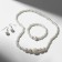 Set 3 objects: earrings, necklaces, bracelet "Pearls" elegant, white color in silver