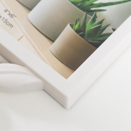 Photo frame plastic in 3 photos 10x15 cm "Rose in the leaves" white 40x21.5 cm-1