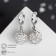Earrings with “Shambhala” rhinestones, white color in silver