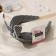 Hair cap "Emilia" strips, 5 cm, black