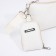 Bag Cross-Bodi with a zipper, white color