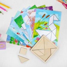 Tangram with a set of cards 