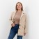 Female jacket, light beige color, goose foot, size 50