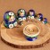 Nesting doll "white flowers", blue dress, 10 puppet, 12 cm
