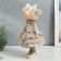 Interior doll "Baby with a bow in hair, with a flower" 35x13.5x20 cm