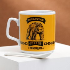 Ceramic mug with a spoon 
