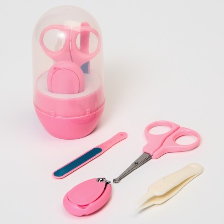 Manicure child: scissors, tongs, saws, tweezers, pink color