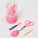 Manicure child: scissors, tongs, saws, tweezers, pink color