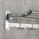 The shelf is hinged with a holder of towels, 4 double hooks, 59.5 × 26 × 14 cm, color chromium