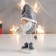 Suvenir Polystone "Santa Claus with a gift" mix gray, thin legs 14x6.5x5 cm