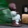 Figure "Buddha Karatist", 7x9 cm, yellow