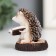 Polystone souvenir "Hedgehog on a stump - reading" 5.2x4.3x4.6 cm