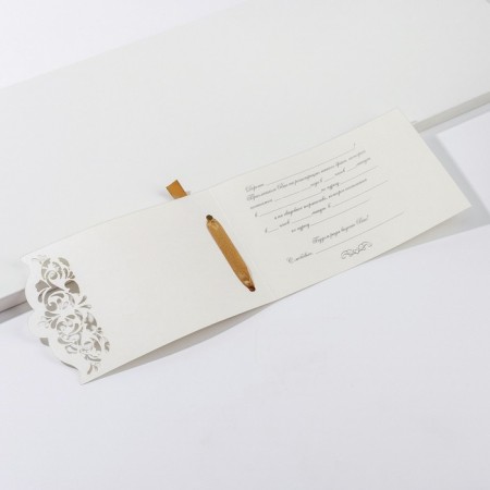 Invitation to a wedding with a golden ribbon, carved, white-2