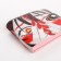 The wallet on the button, the color is gray/red