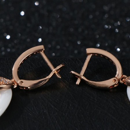 Earrings ceramics "oval" hanging, white color in gold-1