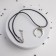 Piece on the cord "Horn Horn", color black silver on a black lace, 42 cm