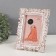 Photo frame Plastic 10x15 cm "Rose and curls of rose" white with gold 20.5x15.5 cm