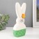 Souvenir Ceramics "Bunny sleeping, with chamomile on the ear" White-green 10.4x4.3x23.7 cm