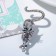 Brooch "Cat is graceful", green color in black silver