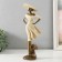 Polystone souvenir "Girl in a wide -brimmed hat" Sand with bronze 11x8.5x30 cm