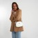Bag Women's Cross-Bodi with a zipper, white color