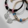 Bracelets "Demetrons" leaves with beads, black-beige color, 8 cm