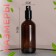 A bottle for storage, with a spray, 100 ml, brown/black color