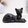 The figure "cats lie" black, 18x10x12cm