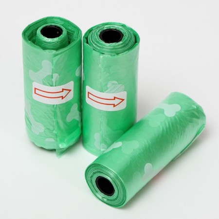 Packages for cleaning for dogs with printing (3 rolls of 15 packages 29x21 cm), green