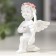 Souvenir Polystone "Cupid" in a wreath of roses, mix, 6.5x6x5 cm