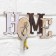 The keywater is wall -mounted "Home", 21 x 9 cm.