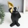 Souvenir Polystone stand "A man with a bird on the shoulder" black 14x33 cm