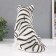 The piggy bank "Tiger white" height is 23.5 cm, width 16 cm, length 23 cm.