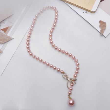 The necklace is “pearl” with a flipping element, dragonfly, pink color in gold, 50 cm-3