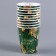 A cup paper one -time “Happy New Year”, emerald