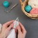 The knitting needles are circular, for knitting, with Teflon coating, with plastic fishing line, D = 5 mm, 14/80 cm