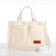 Youth bag with zipper, milk color
