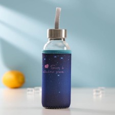 A glass bottle in the case 
