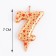 Candle in the Sanata cake, number "7", gold with red stars, 5.5 cm