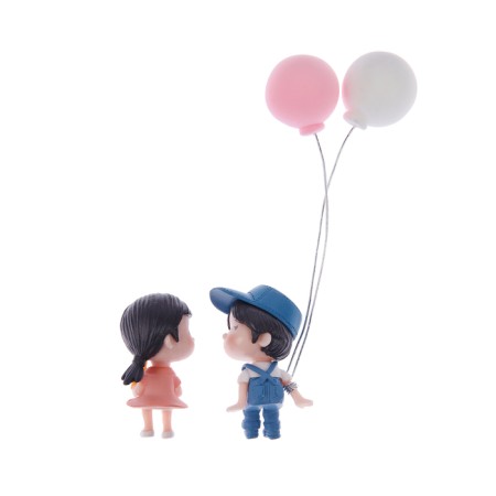 Toy on a car panel, a couple in love, K5-3